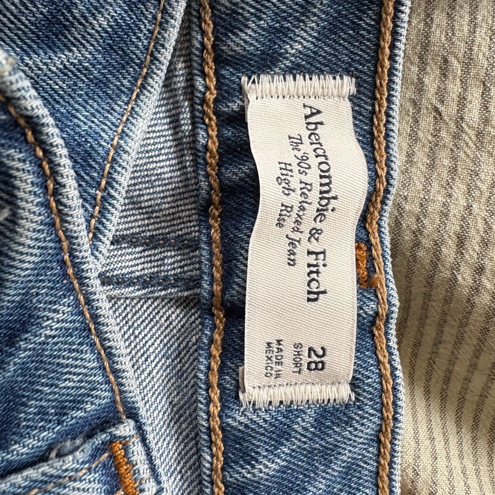 Abercrombie & Fitch Women’s  Jeans. Size 28 short. Dark with Back Distressed Hem